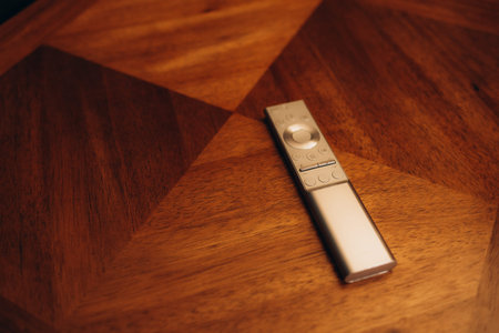 remote control on wood table. High quality photo