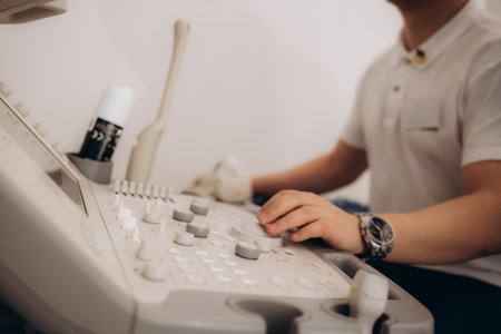 Close up of ultrasound machine in clinic. Health care, diagnostic and disease prevention concept. Modern apparatus medical equipment. Ultrasonography . No peopleの写真素材