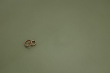 A ring is a circular band, typically made of metal, worn as ornamental jewelry around a finger, but sometimes worn on other body parts such as the ears earrings or nose . Rings can be siの写真素材