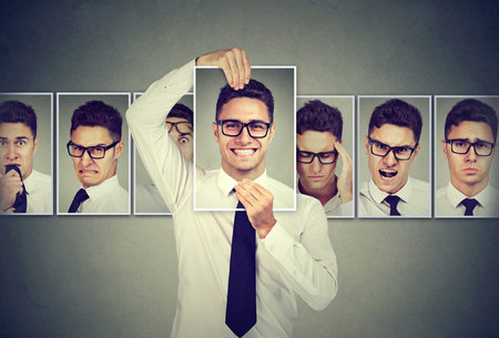 Masked man in glasses expressing different emotions 