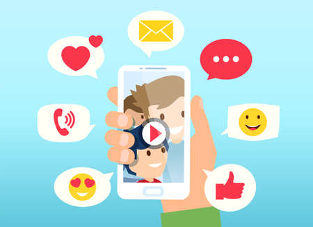 Vector of a young man watching viral content on a smartphone with likes, shares and comments icons popping up on mobile phoneのイラスト素材