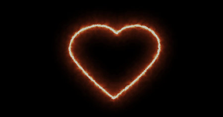 Fiery heart on a black background. Abstract hot heart shape, flame frame. Gradually, a burning outline of fire and constant burning appeared. effect design element. footageの写真素材