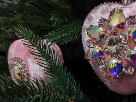 New year Christmas background. Christmas tree with decoration, lights. Merry Christmas and Happy Holidays greeting card, frame, banner. holidays, winter and celebration concept. High quality photoの写真素材