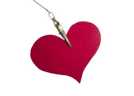 Paper hearts hanging over white backgroundの写真素材