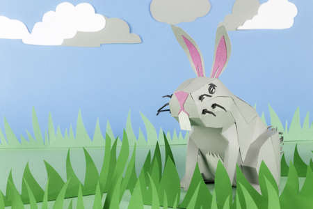 Rabbit made of paper in a happy paper environmentの写真素材