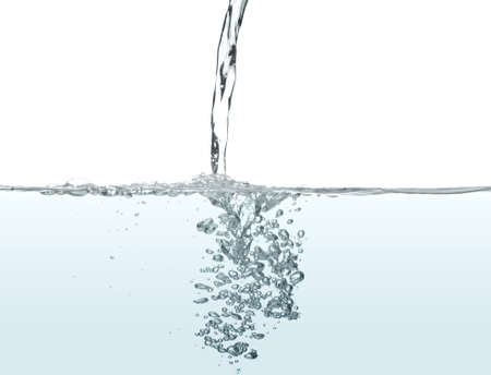 Water been poured into more water, making bubblesの写真素材