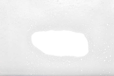 White foam from soap over white background with space for text の写真素材