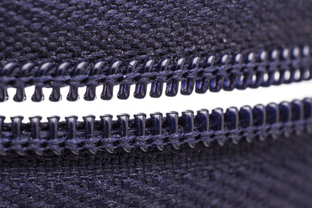 Purple zipper over white background