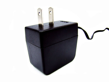 Power supply. DVD player charger isolated over white background.