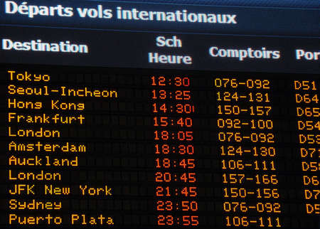 Canadian airport information board, international departures, French.のeditorial素材