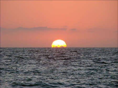 Sunset on the west coast of Mexico.の写真素材