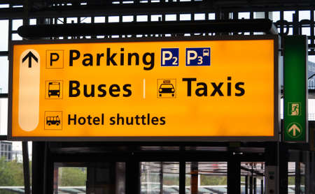 Amsterdam Schiphol terminal sign: bus, taxi and parkingの写真素材