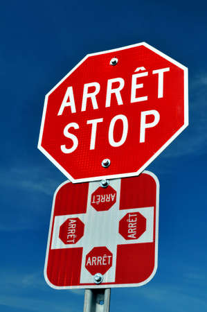 Bilingual French English stop sign in Quebec, Canadaの写真素材