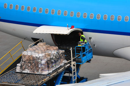 Air transportation: airplane loading cargo