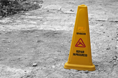 Yellow cone, repairs and work in progress signs.の写真素材