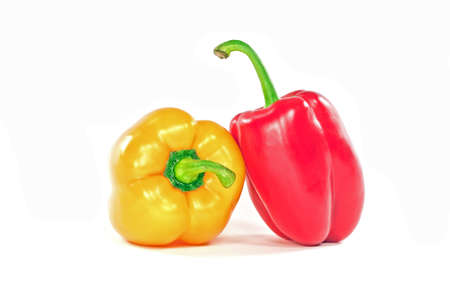 Red and yellow peppers on white background.の写真素材
