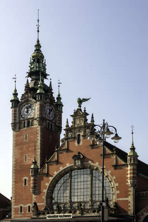 Polish architecture, clock tower at the Gdansk train station.の写真素材