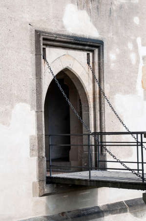 Chain driven gothic door at medieval castle in Europe のeditorial素材