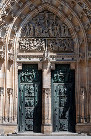 Detail of the impressive Saint Vitus Cathedral door in Prague, Czech Republic の写真素材