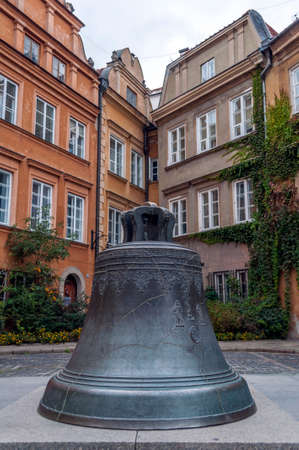 Point of interest  cracked bell at Kanonia Square, in the Old Town of Warsaw, Poland の写真素材