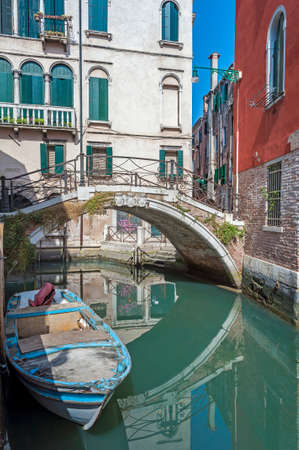 Bridge over a canal in Venice, Italy の写真素材