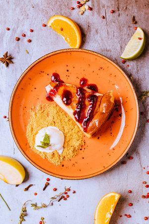Pancake with berry sauce and ice cream, square imageの写真素材