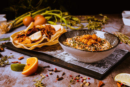 Bowl of quinoa with chickpeas, raisins and spicesの写真素材