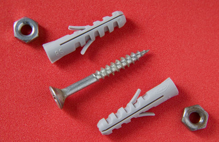 Screw with rawlplugs and two nutes
