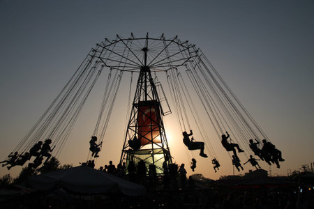 Silhouette of young people on sunset
