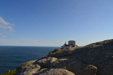 Cape Finisterre. The Romans thought that this was the westernmost point on earth and, therefore, the world ended here. We can also find Km 0 of the Camino de Santiago, in Spain.の写真素材