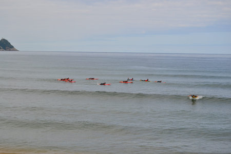 Surfers on the beach of Zumaia, in GuipÃºzcoa, Basque Country, Spainの写真素材