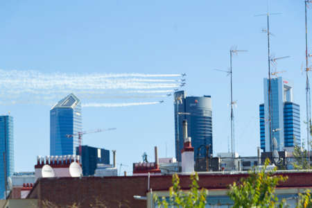 MADRID, SPAIN - OCTOBER 12, The Eagle Patrol of the Air Force flying over the sky of Madrid celebrating the National holiday of Spain.のeditorial素材
