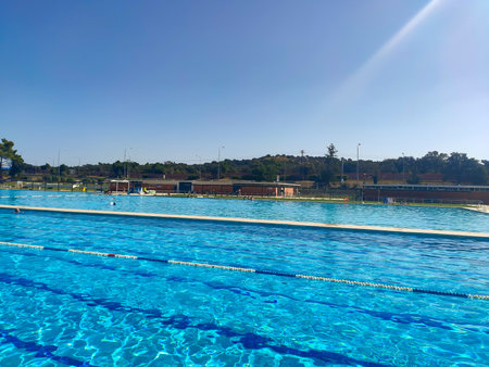 MADRID, SPAIN - AUGUST 12, 2021. Public swimming pool at the Puerta de Hierro facilities in the...