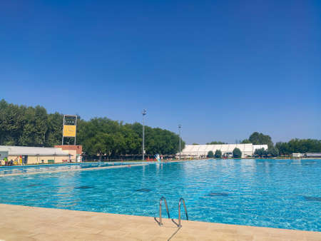 MADRID, SPAIN - AUGUST 12, 2021. Public swimming pool at the Puerta de Hierro facilities in the Community of Madrid, in Spain. Europe. Horizontal photography.のeditorial素材