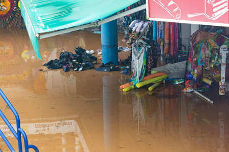 BENICÃSSIM - BENICÃSIM, SPAIN - AUGUST 29, 2021. Streets, promenades and beach flooded in the city of BenicÃ ssim after the rains and storms that flooded the town. Horizontal photography.のeditorial素材