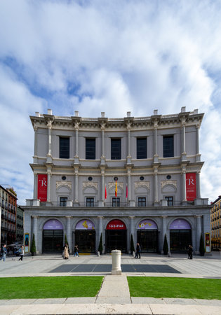Beautiful view of Teatro Real from Plaza de Oriente on blue sky with high white clouds in Madrid,...