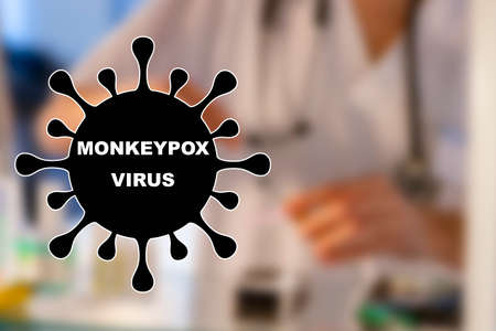 Monkeypox. Nurse. Medical. Text written on an unfocused background and virus design of a nurse with an injection to give a vaccine. Virus disease concept. Horizontal photography and design. Smallpox.の写真素材