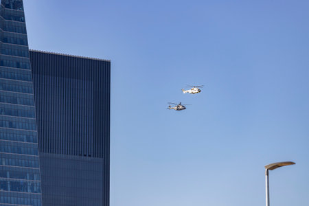 helicopter. airplane. Military vehicle. Spanish Air Force on the day of the National Holiday of October 12 flying over the streets of the city of Madrid. MADRID, SPAIN - OCTOBER 12のeditorial素材