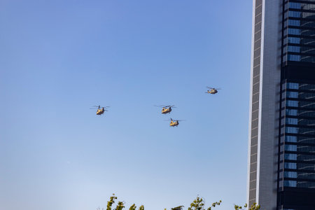helicopter. airplane. Military vehicle. Spanish Air Force on the day of the National Holiday of October 12 flying over the streets of the city of Madrid. MADRID, SPAIN - OCTOBER 12のeditorial素材