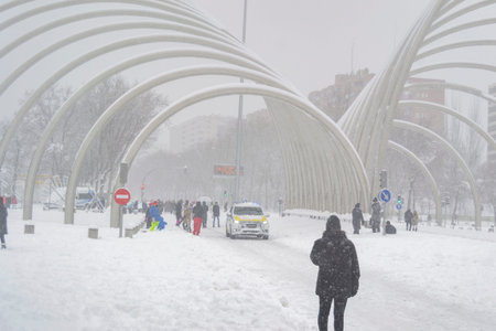 Snow. Winter. Streets covered in a white blanket of snow that covers all the elements that are on...