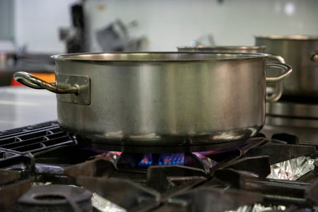 Stoves. Kitchen room. Gas stove with burning propane gas flames. Concept of industrial resources and economy.の写真素材