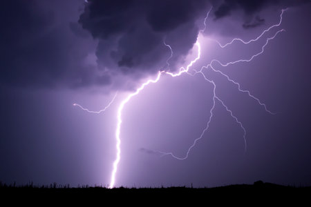 Ray. lightning. Electric storm. Strong electrical storm with a multitude of lightning and thunder. Lightning storm over fields of Spain. Photography of lightning.の写真素材