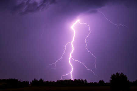 Ray. lightning. Electric storm. Strong electrical storm with a multitude of lightning and thunder. Lightning storm over fields of Spain. Photography of lightning.の写真素材