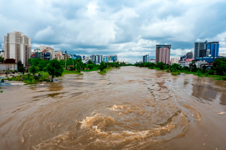 Flash flood. Torrential rains that fill the rivers and roads instantly causing flooding. Rain concept. Torrential rain. floods.の素材
