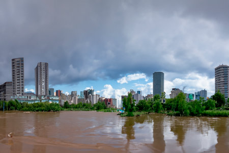Flash flood. Torrential rains that fill the rivers and roads instantly causing flooding. Rain concept. Torrential rain. floods.の素材