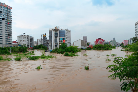 Flash flood. Torrential rains that fill the rivers and roads instantly causing flooding. Rain concept. Torrential rain. floods.の素材