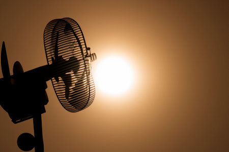 Heat wave. Hot sun of heat wave. Climate change. Global warming. High temperature thermometer. Heat wave in Europe. California. Heat wave over the city skyline. Climate change.の素材