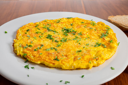 Spanish Omelet. Spanish omelette with potatoes and onion, typical Spanish cuisine. Spanish omelette. Botulism outbreak. Spain.の素材