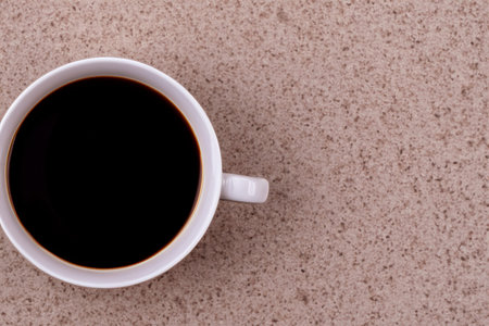 Coffee. Cup. Coffee with milk. Space for text. Design in the cafe. Close up of coffee cup with...