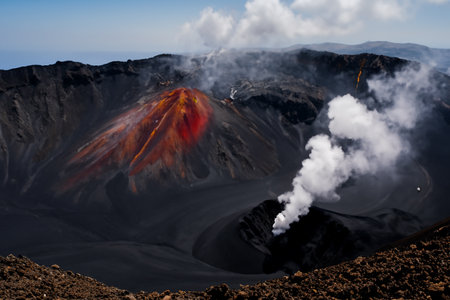 Etna. They overturn with magma on the walls of the volcanic cone. Hot wash. New eruption. 2023. Hot rocks.の素材